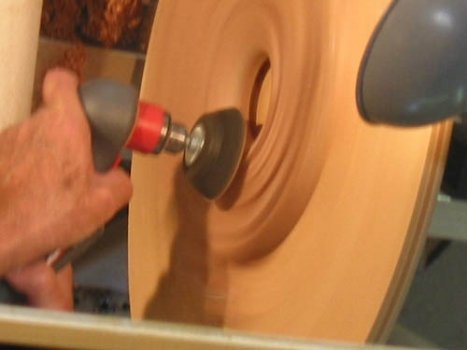 Power sanding with the lathe on