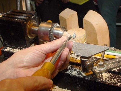 Shaping the handle of the mini-top