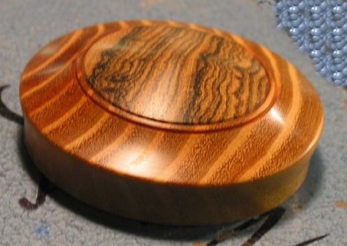 Completed lid. The finish brings out the complementary colors of the Osage Orange and the Bocote
